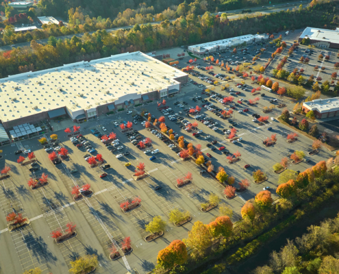 View from above of american grocery store with many parked cars